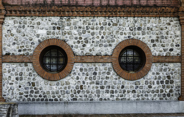 rusty  facade with round windows