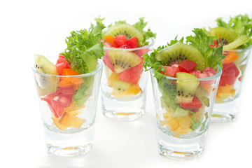 Colorful natural fruit salad in  glasses