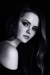 Naklejka premium Beauty girl hair woman on black background studio fashion 