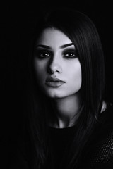 Fototapeta premium black and white portrait monochrome make up smokey eyes black background studio hair 