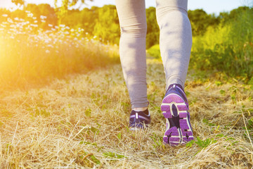 Woman running in a field
