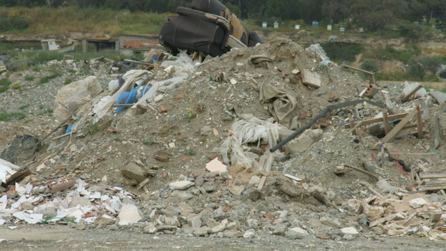 Abandoned waste deposit. Environmental pollution problem. Nature preservation 