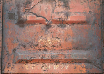 old freight wagon. texture of rusty painted metal 