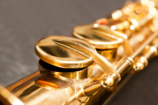 Detail valves saxophone closeup in golden colors