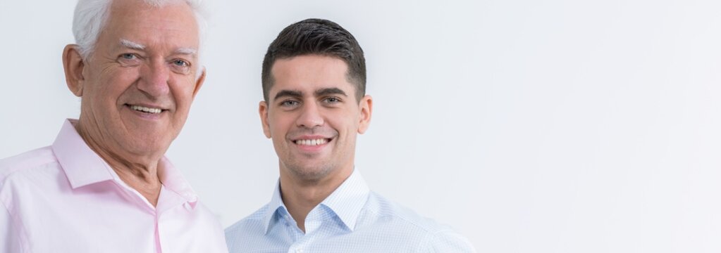 Smiling father and son