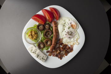 Breakfast served on a white plate