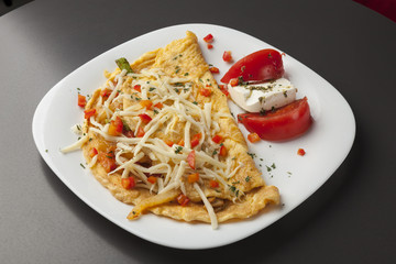 scrambled eggs served on a white plate