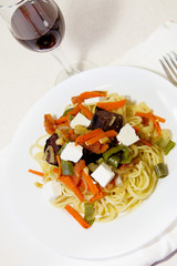 Pasta with vegetables and red wine