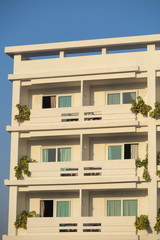 Modern hotel building element against a blue sky