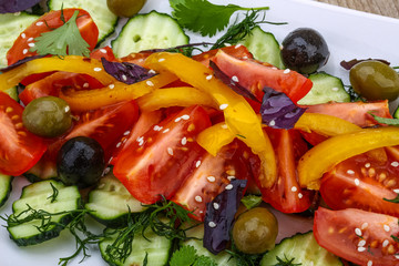 Salad with tomato, cucumber and olives