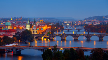Obraz premium Evening over river Vltava near Charles bridge in Prague, Czech