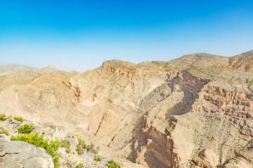 Fototapeta premium Ridge view of Jabal Akhdar in Al Hajar Mountains, Oman. This place is 2000 meters above sea level.