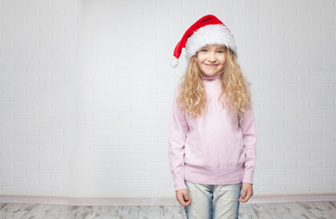 Child in christmas hat