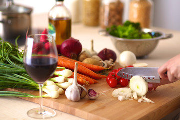 Young Woman Cooking in the kitchen. Healthy Food