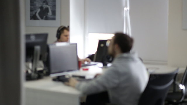 GRODNO, BELARUS - NOV 13: Software developers during the working process in belorussian office of *instinctools GmbH, on NOVEMBER 13, 2015 in GRODNO, BELARUS