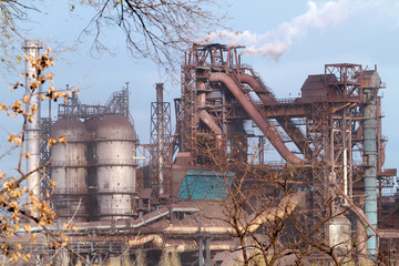 Fototapeta na wymiar Ukraine, Dneprodzerzhinsk, Fall 2015. Old factory works, pipe s