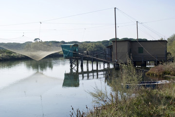 Stilt house and fishing nets along the Po Delta. Italy