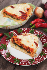 Pasticcio with chard and tomato sauce