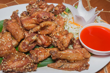 Fried chicken wings with sauce