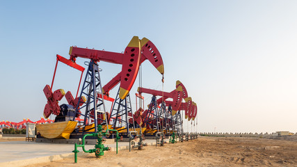 view of oilfield with pump units running