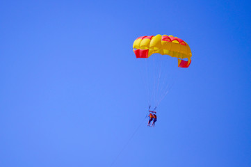 parachute in the blue sky