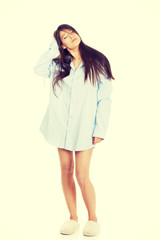 Young morning woman in big shirt.
