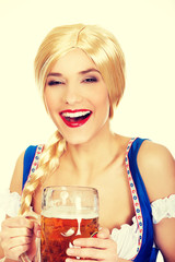 Beautiful bavarian woman with beer.