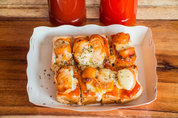 Toast homemade pizza split slices are good.Selective focus used.