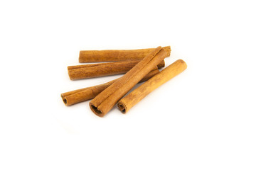 Cinnamon sticks on white background