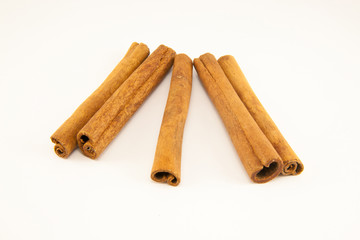 Cinnamon sticks on white background