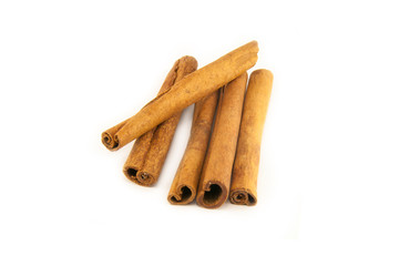 Cinnamon sticks on white background