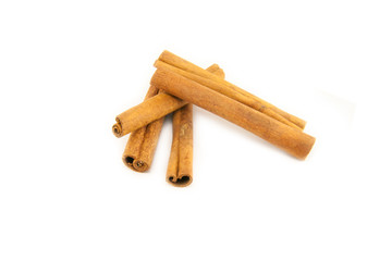 Cinnamon sticks on white background