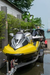 Photo sur Aluminium Sports nautique Water scooter or jet ski on the beach
