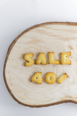 Bread letters wording sale 40% on wood background