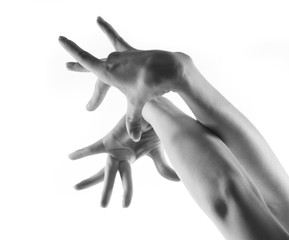 Ballet dancer hands over white