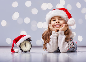 child in a Christmas hat