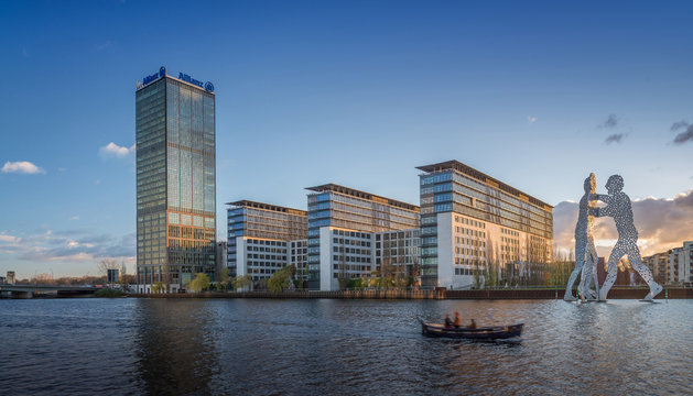 The Treptowers in Berlin Treptow with the Molecule man statue in front