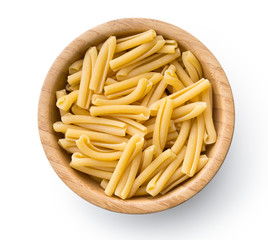 uncooked pasta caserecce in bowl