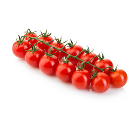 Ripe fresh cherry tomatoes on branch isolated on a white background.