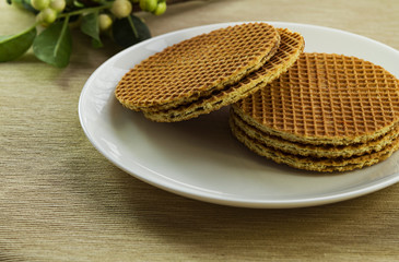
Dutch waffles on a white plate