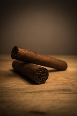 Cigars on a wooden table