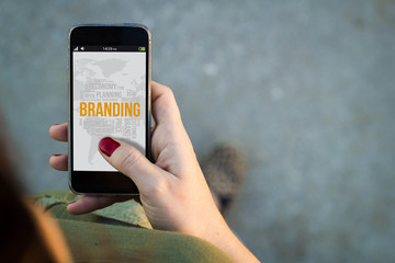 Woman walking smartphone branding