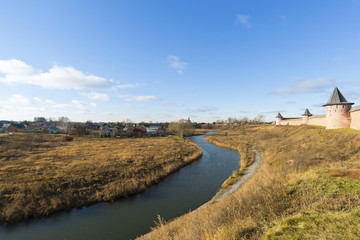 Landscape with  river Kamenka and Wall St. Euthymius monastery in Suzdal, Russia. Golden Ring of Travel