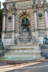 Fototapeta na wymiar statues of Fountain Saint Michel in Paris