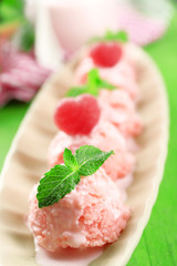Watermelon ice cream in bowl  on color wooden background