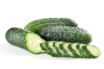 Sliced cucumbers isolated on white