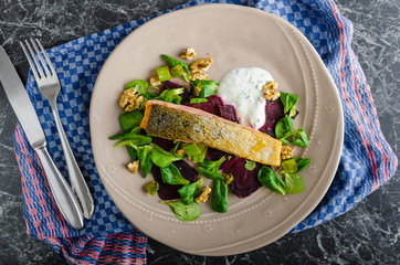 Fried salmon with herbs and beets