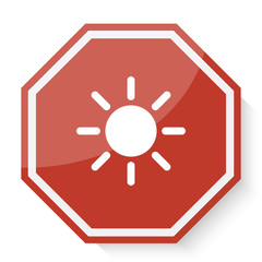 White Sun icon on red stop sign web app