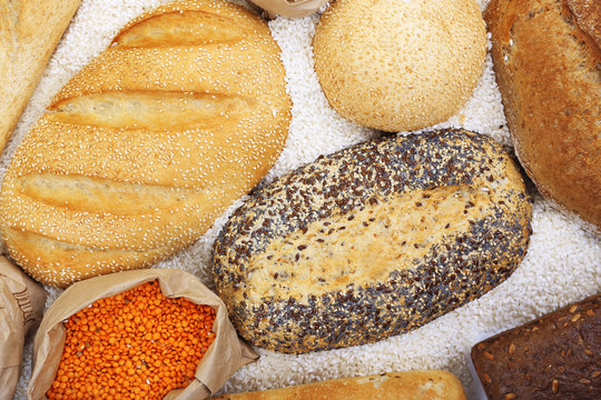 Mixed breads and grains background, close up