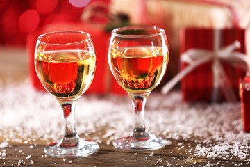 Champagne and Christmas decoration on wooden table